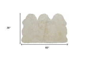 HomeRoots 3' X 5' Luxurious Handcrafted Golden Natural Sheepskin Area Rug - Cozy, Durable, and Hypoallergenic 388534