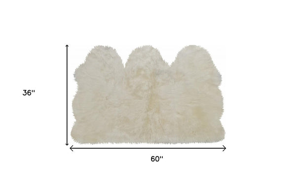 HomeRoots 3' X 5' Luxurious Handcrafted Golden Natural Sheepskin Area Rug - Cozy, Durable, and Hypoallergenic 388534