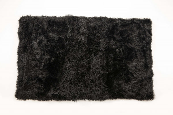 Homeroots 3' X 5' Black Natural Rectangular Sheepskin Area Rug  Genuine Sheepskin 388536