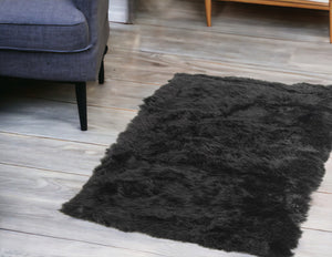 Homeroots 3' X 5' Black Natural Rectangular Sheepskin Area Rug  Genuine Sheepskin 388536