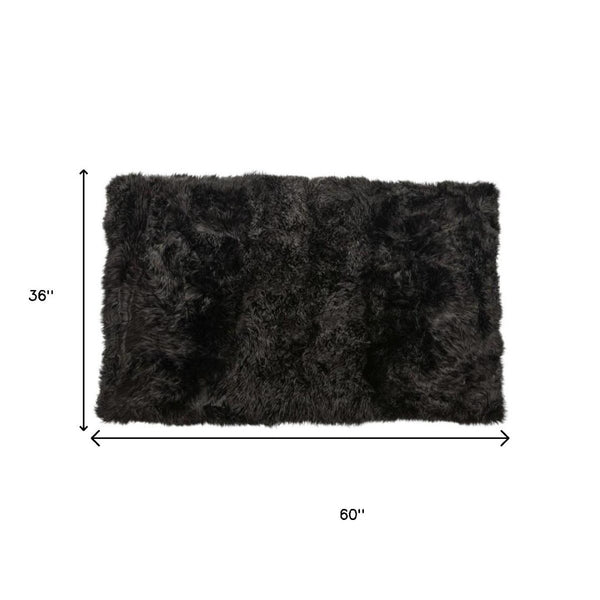 HomeRoots 3' X 5' Luxurious Black Natural Sheepskin Area Rug - Soft, Durable, and Versatile Home Decor Accent 388536