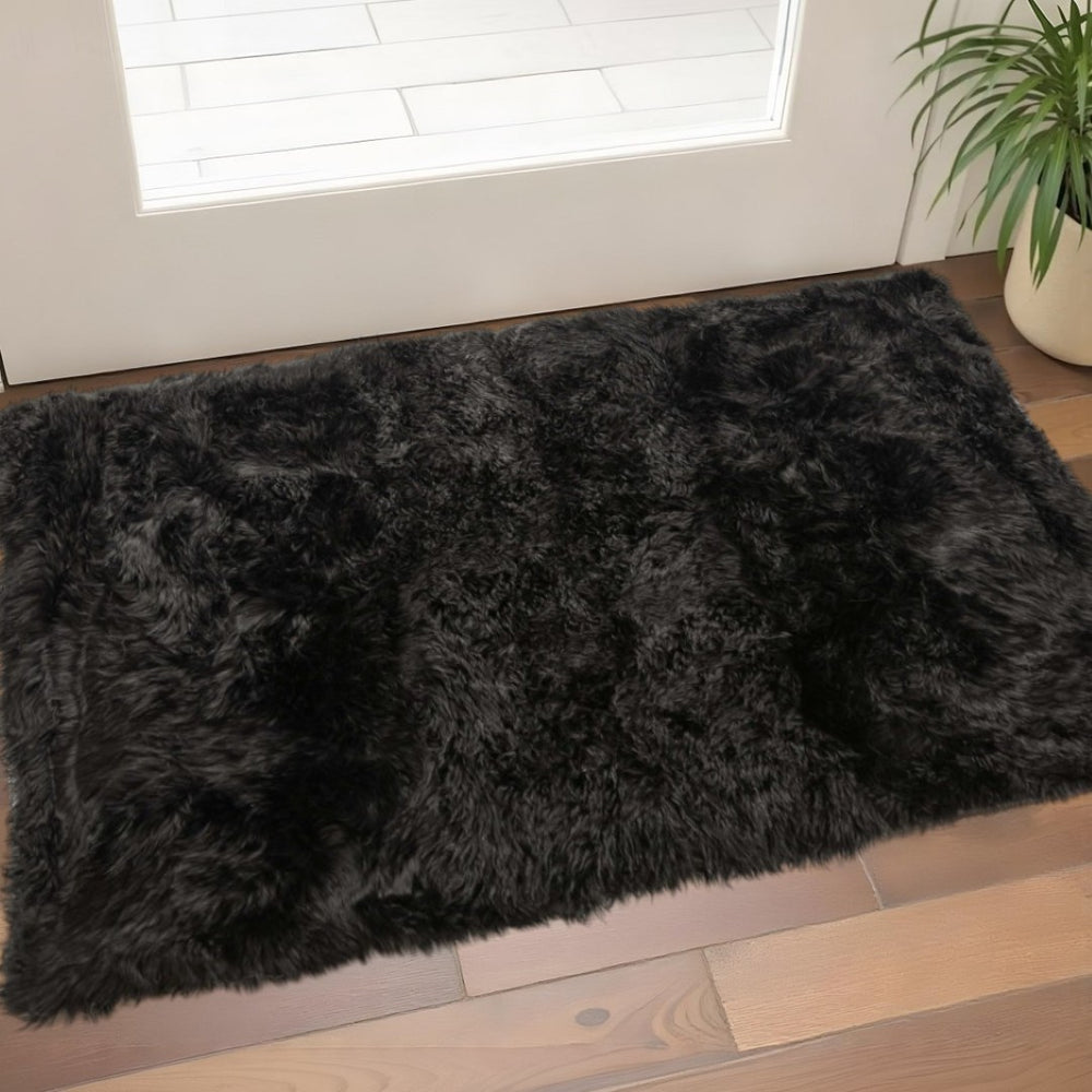 HomeRoots 3' X 5' Luxurious Black Natural Sheepskin Area Rug - Soft, Durable, and Versatile Home Decor Accent 388536
