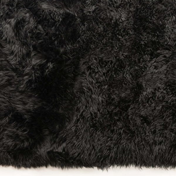 Homeroots 3' X 5' Black Natural Rectangular Sheepskin Area Rug  Genuine Sheepskin 388536