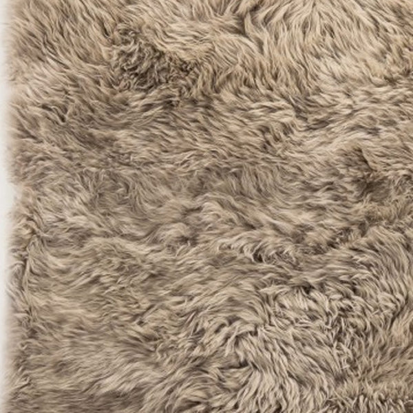 HomeRoots 3' X 5' Taupe Genuine Sheepskin Area Rug - Luxurious New Zealand Softness for Cozy Home Decor 388538