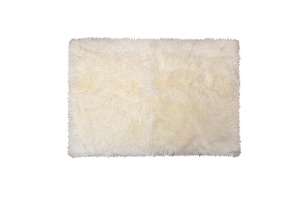 Homeroots 2' X 5' Natural Rectangular Sheepskin Area Rug  Genuine Sheepskin 388539