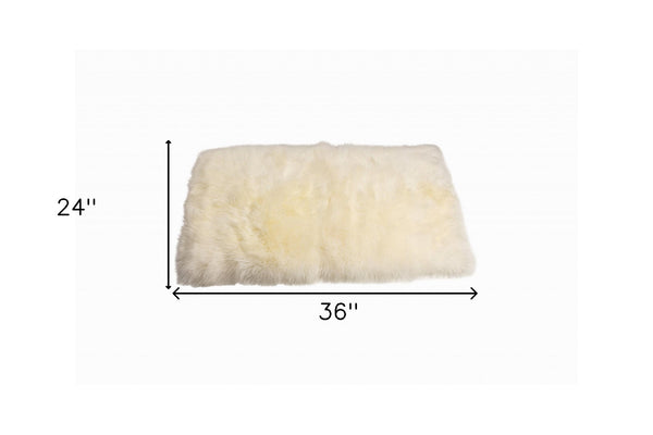 Homeroots 2' X 5' Natural Rectangular Sheepskin Area Rug  Genuine Sheepskin 388539