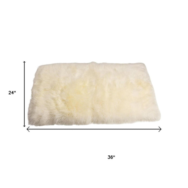 HomeRoots 2' X 5' Natural Sheepskin Area Rug – Luxurious, Soft, Hypoallergenic Decor for Cozy Living Spaces 388539