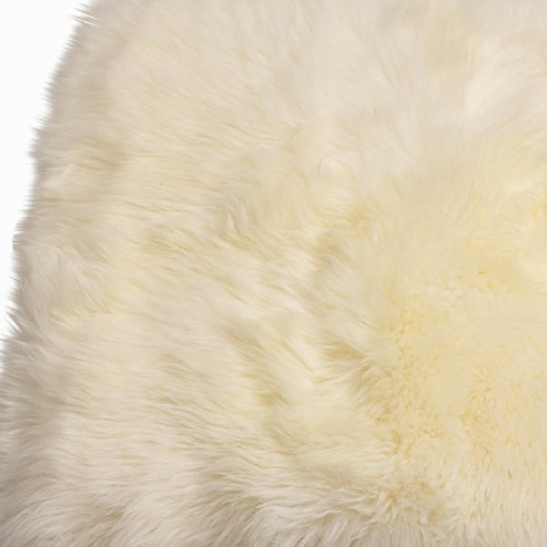 Homeroots 2' X 5' Natural Rectangular Sheepskin Area Rug  Genuine Sheepskin 388539