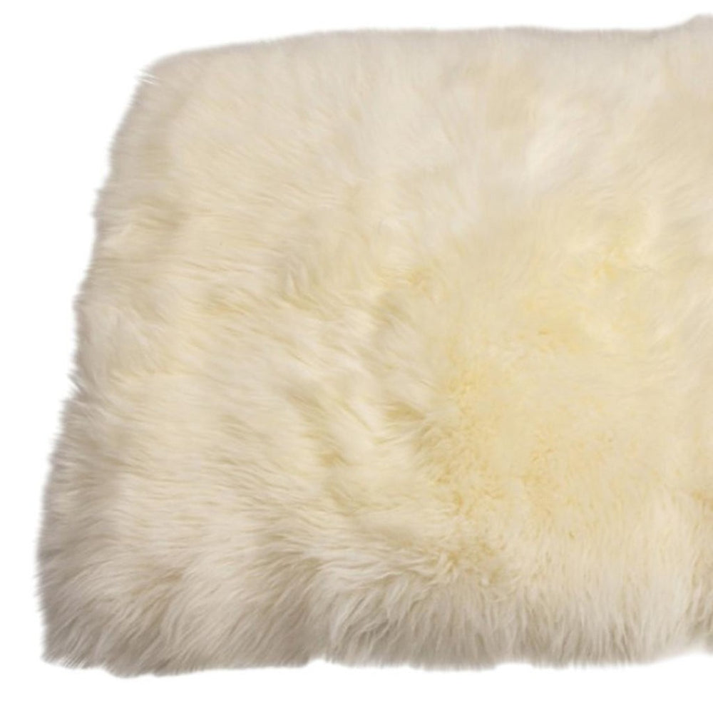 HomeRoots 2' X 5' Natural Sheepskin Area Rug – Luxurious, Soft, Hypoallergenic Decor for Cozy Living Spaces 388539