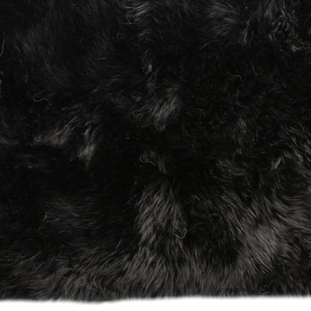 HomeRoots 2' X 5' Luxurious Black Natural Sheepskin Area Rug - Ultra-Plush Comfort for Home & Decor Style 388540