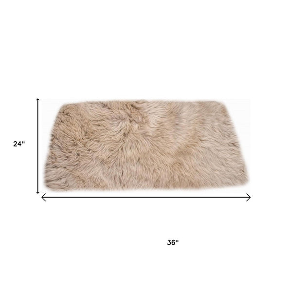 HomeRoots 2' X 3' Taupe Sheepskin Area Rug - Luxurious Handcrafted Accent for Cozy, Stylish Interiors 388542