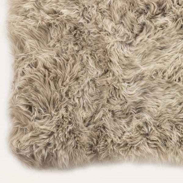 HomeRoots 2' X 3' Taupe Sheepskin Area Rug - Luxurious Handcrafted Accent for Cozy, Stylish Interiors 388542