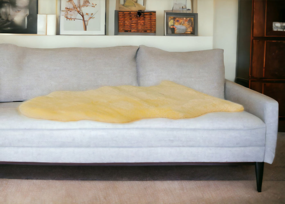 Homeroots 2" X 4" Natural Off White Medical Grade Sheepskin Throw Blanket  Sheepskin 388645