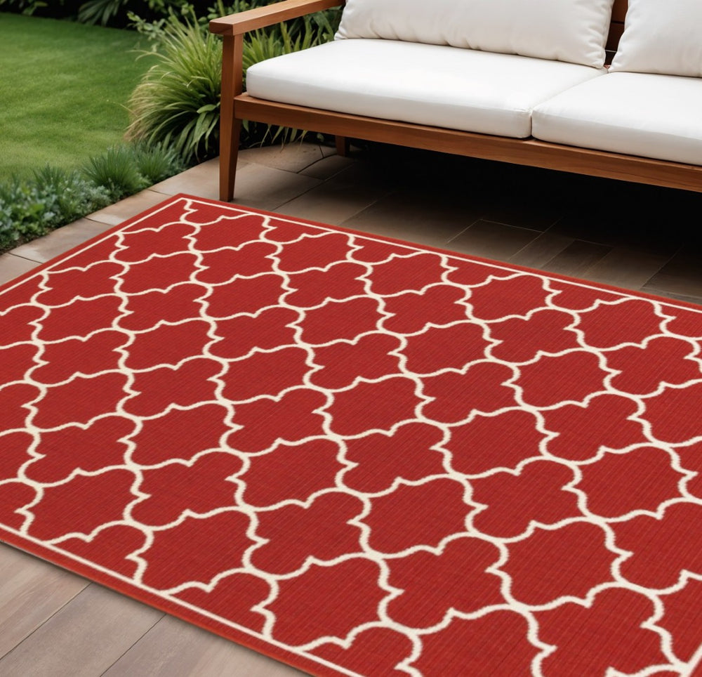 HomeRoots 5' Red and Ivory Indoor/Outdoor Area Rug – Durable, Weather-Resistant Design for Any Space 6'7" x 9'6" 388662