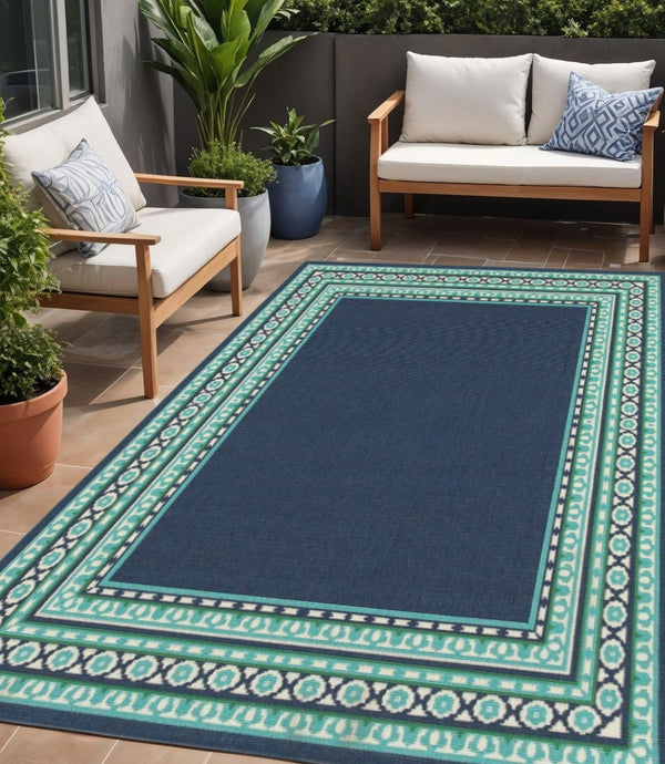 HomeRoots 5' Indoor Outdoor Area Rug in Bold Blue and Green - Stylish Geometric Design for Versatile Spaces 5'3" x 7'6" 388675