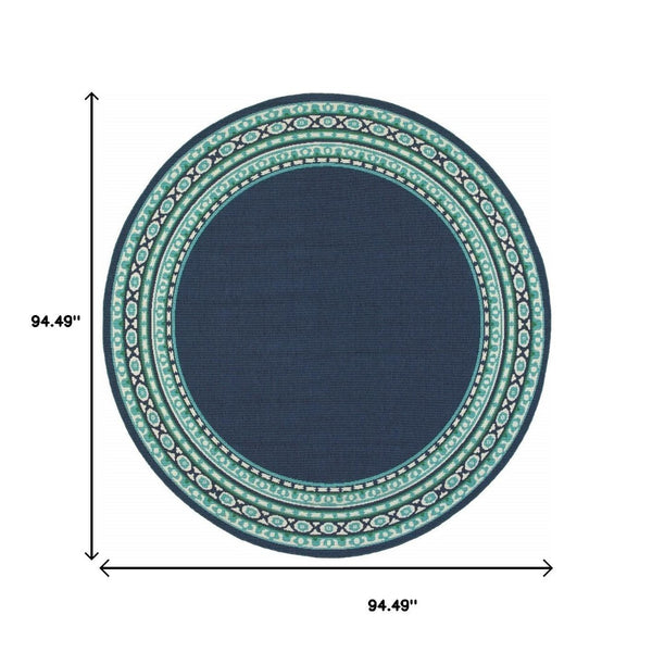 HomeRoots 5' Indoor Outdoor Area Rug in Bold Blue and Green - Stylish Geometric Design for Versatile Spaces 7'10" Round 388678