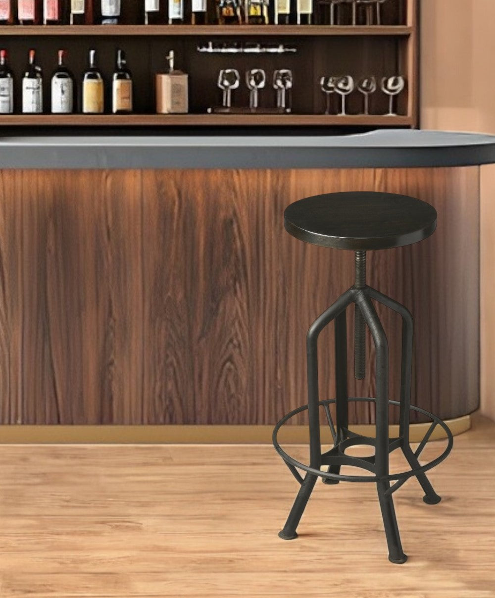 Homeroots 39" Black Manufactured Wood And Iron Backless Swivel Bar Chair   389044