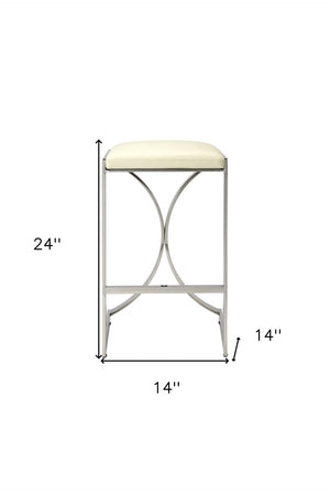 HomeRoots 24" Modern Off White Faux Leather Bar Chair with Silver Iron Frame – Stylish Backless Design for Comfort 389116