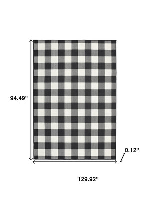 HomeRoots 5' Timeless Indoor Outdoor Area Rug - Durable, Stylish Design Perfect for Patios, Kitchens, and More Black/ Ivory 7'10" x 10'10" 389521