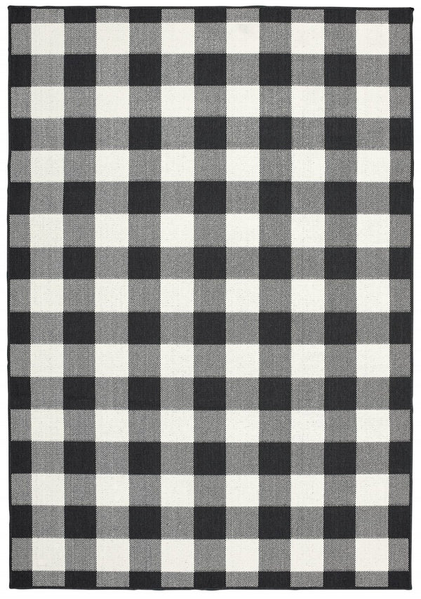 HomeRoots 5' Timeless Indoor Outdoor Area Rug - Durable, Stylish Design Perfect for Patios, Kitchens, and More Black/ Ivory 7'10" x 10'10" 389521