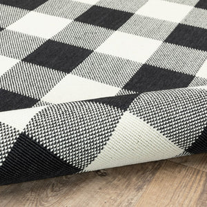 HomeRoots 5' Timeless Indoor Outdoor Area Rug - Durable, Stylish Design Perfect for Patios, Kitchens, and More Black/ Ivory 7'10" x 10'10" 389521