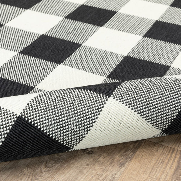 HomeRoots 5' Timeless Indoor Outdoor Area Rug - Durable, Stylish Design Perfect for Patios, Kitchens, and More Black/ Ivory 7'10" x 10'10" 389521