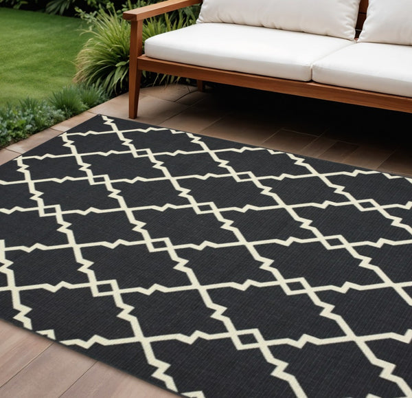 HomeRoots 5' Black and Ivory Area Rug – Elegant Indoor Outdoor Style, Durable, Easy Care for Versatile Spaces 6'7" x 9'6" 389534