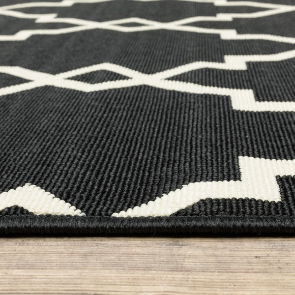 HomeRoots 5' Black and Ivory Area Rug – Elegant Indoor Outdoor Style, Durable, Easy Care for Versatile Spaces 6'7" x 9'6" 389534