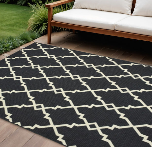 HomeRoots 5' Black and Ivory Area Rug – Elegant Indoor Outdoor Style, Durable, Easy Care for Versatile Spaces 7'10" x 10'10" 389535