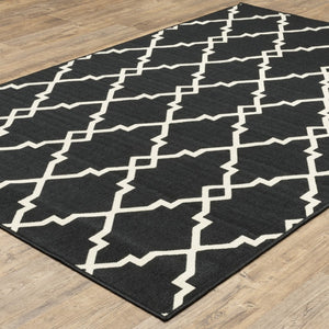 HomeRoots 5' Black and Ivory Area Rug – Elegant Indoor Outdoor Style, Durable, Easy Care for Versatile Spaces 7'10" x 10'10" 389535