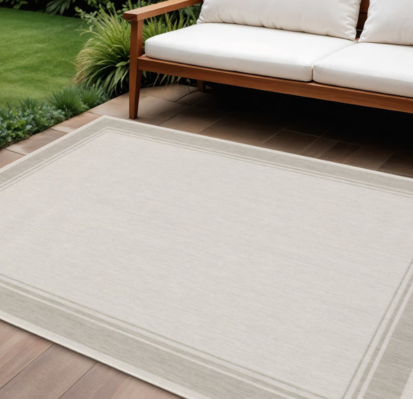 HomeRoots 7' Elegant Gray and Ivory Indoor Outdoor Area Rug - Durable, Low-Maintenance Design for Any Space 9'10" x 12'10" 389547