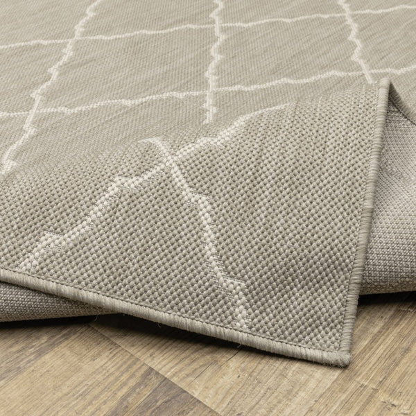 HomeRoots 7' Gray and Ivory Indoor Outdoor Area Rug - Durable, Stylish, Low-Profile Design for Any Space 6'7" x 9'2" 389550