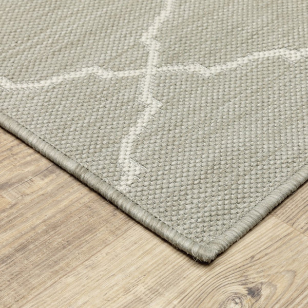 HomeRoots 7' Gray and Ivory Indoor Outdoor Area Rug - Durable, Stylish, Low-Profile Design for Any Space 6'7" x 9'2" 389550