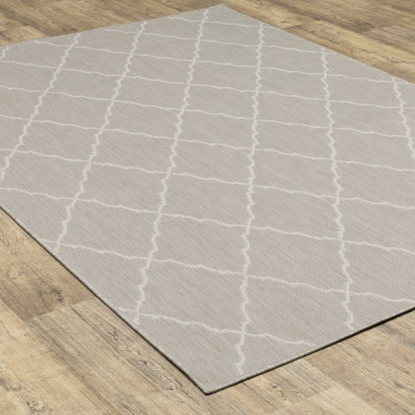 HomeRoots 7' Gray and Ivory Indoor Outdoor Area Rug - Durable, Stylish, Low-Profile Design for Any Space 6'7" x 9'2" 389550