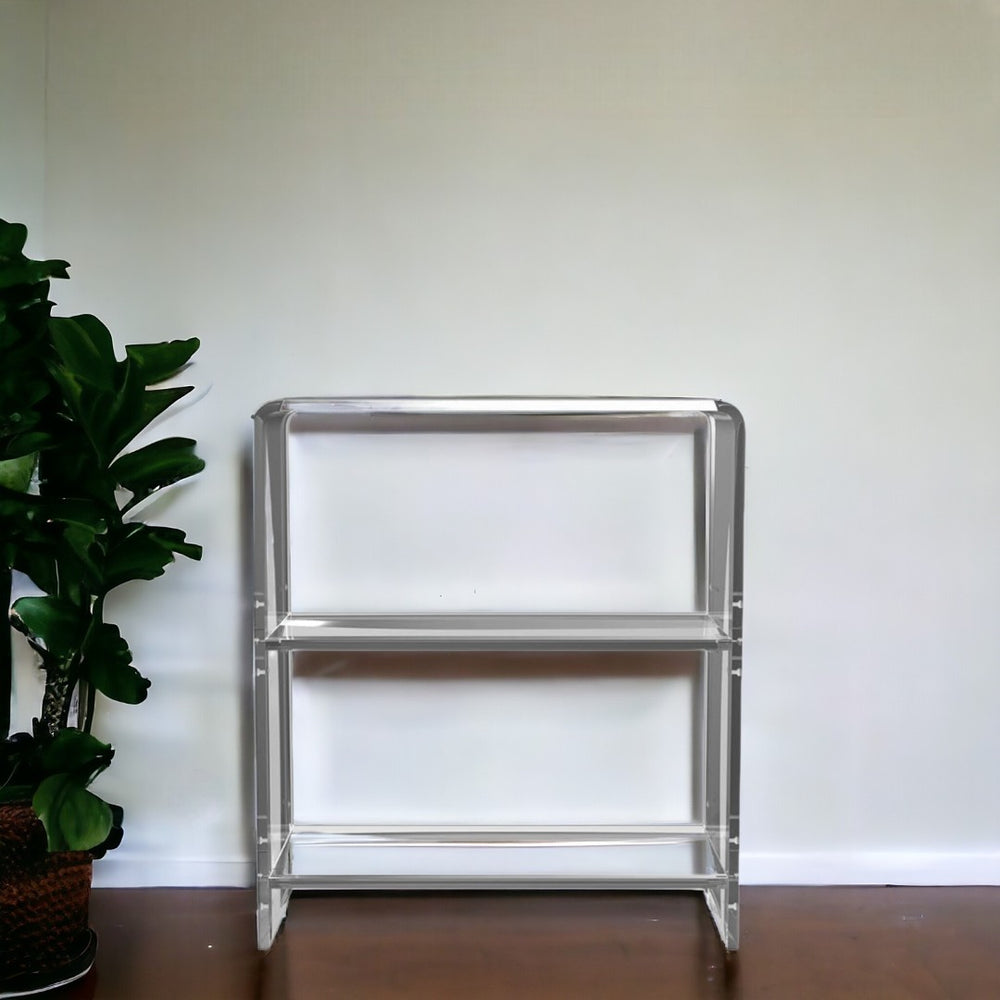 HomeRoots 25" Clear Plastic Two-Tier Bookcase - Stylish Minimalist Storage for Books & Décor in Any Room 389577