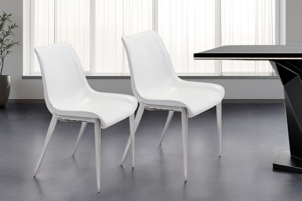 HomeRoots Set of Two Elegant White Faux Leather Dining Chairs with Silver Frame for Modern Spaces 389845