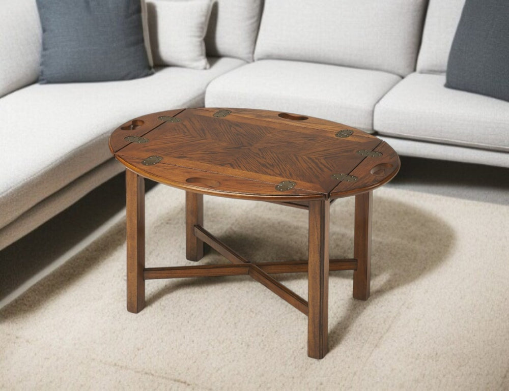 HomeRoots 30" Brown Wood Oval Coffee Table - Elegant Design with Convertible Functionality for Modern Living Spaces 389888