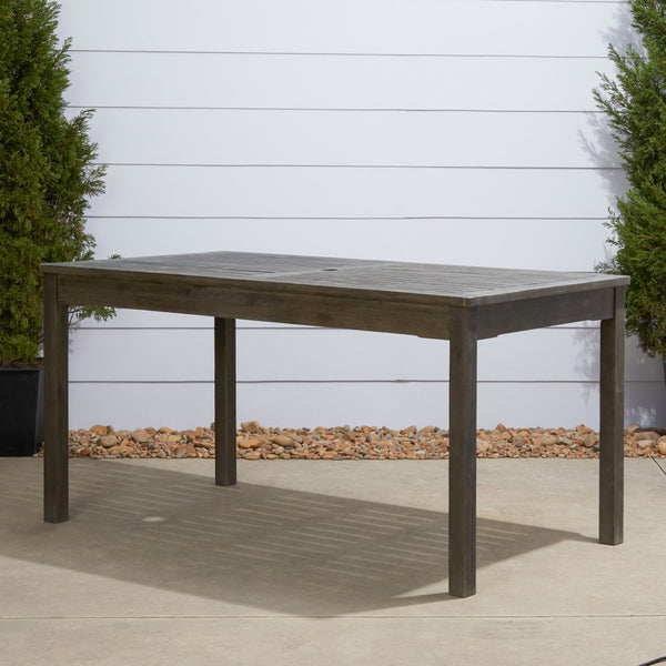 Homeroots 59" Gray Solid Wood Outdoor Dining Table With Umbrella Hole  Wood 390034