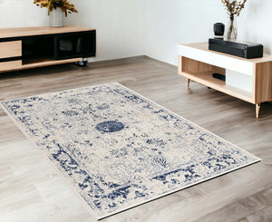 Homeroots 4' X 6' Navy Blue Distressed Floral Area Rug  Polypropylene 390145