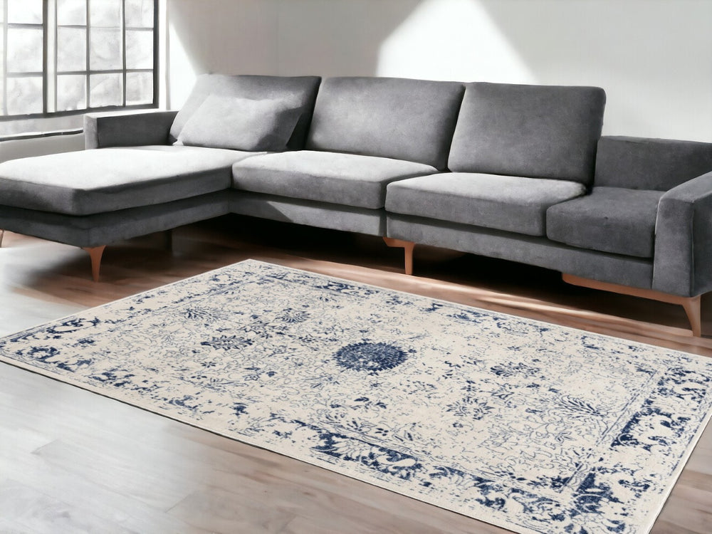 HomeRoots 5' Navy Blue Distressed Floral Area Rug - Timeless Vintage Charm for Elegant Home Décor & Durability 5' x 8' 390146