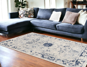 Homeroots 8' X 11' Navy Blue Distressed Floral Area Rug  Polypropylene 390147