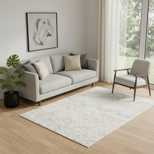 HomeRoots 5' Elegant Ivory Distressed Ikat Area Rug - Soft, Durable, and Versatile for Modern or Traditional Spaces 5' x 8' 390223