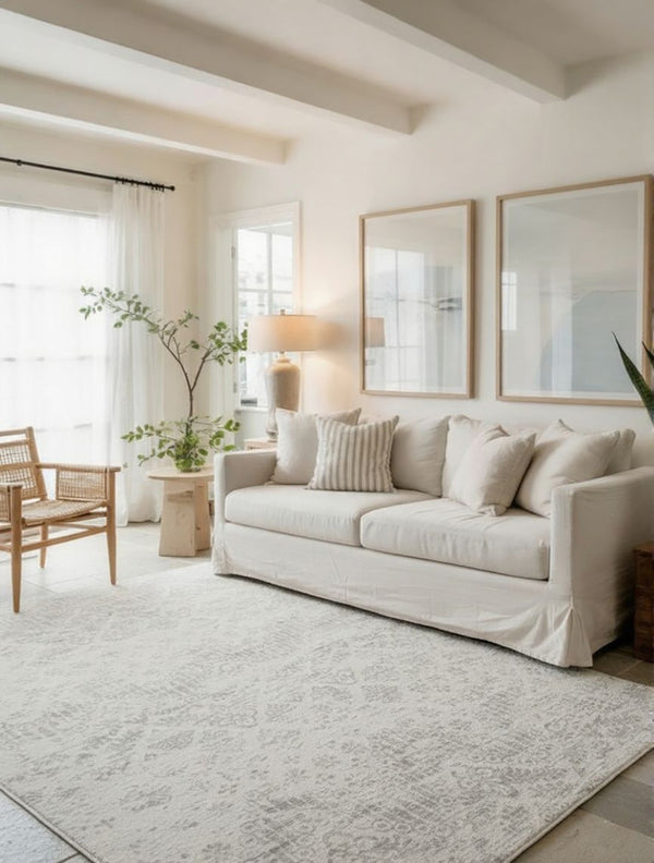 HomeRoots 5' Elegant Ivory Distressed Ikat Area Rug - Soft, Durable, and Versatile for Modern or Traditional Spaces 8' x 11' 390224
