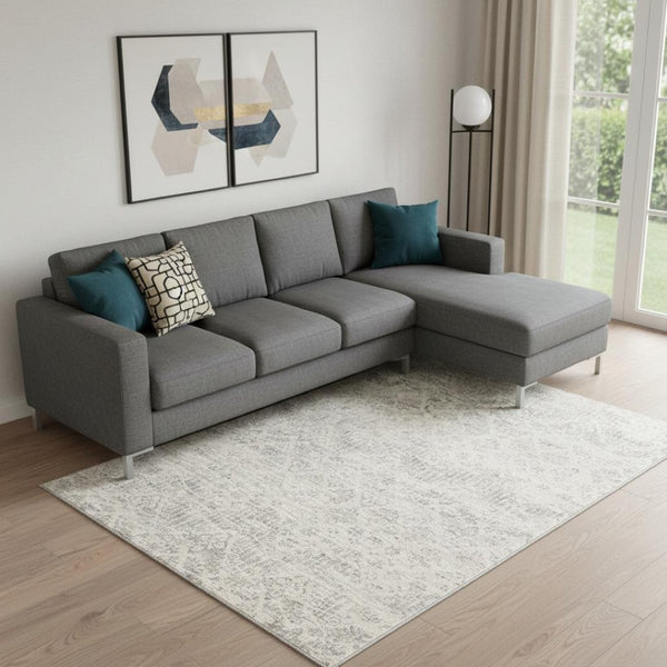 HomeRoots 5' Elegant Ivory Distressed Ikat Area Rug - Soft, Durable, and Versatile for Modern or Traditional Spaces 8' x 11' 390224
