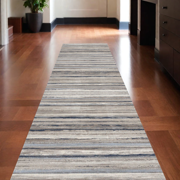 Homeroots 10' Blue And Beige Striped Distressed Runner Rug  Polypropylene 390270