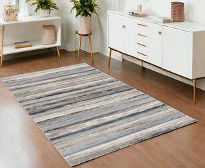 Homeroots 4' X 6' Blue And Beige Distressed Stripes Area Rug  Polypropylene 390281