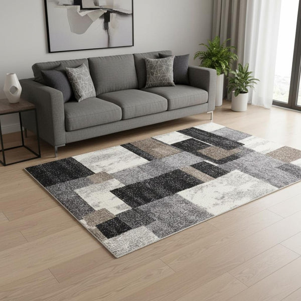 HomeRoots 4' Modern Abstract Geometric Area Rug in Gray, Black, and Brown - Durable, Stain-Resistant Design 5x8 390305