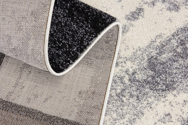 HomeRoots 4' Modern Abstract Geometric Area Rug in Gray, Black, and Brown - Durable, Stain-Resistant Design 8x11 390307