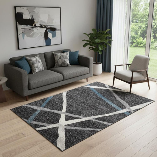 HomeRoots 4' Distressed Black and Gray Abstract Area Rug - Luxurious High Pile, Durable, Perfect for Modern Spaces 5x8 390310