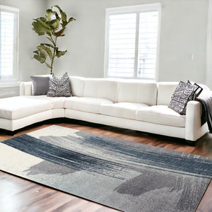 HomeRoots 4' Blue and White Abstract Shag Area Rug - Soft Power Loomed Design for Modern Home Décor and Comfort 7x10 390316